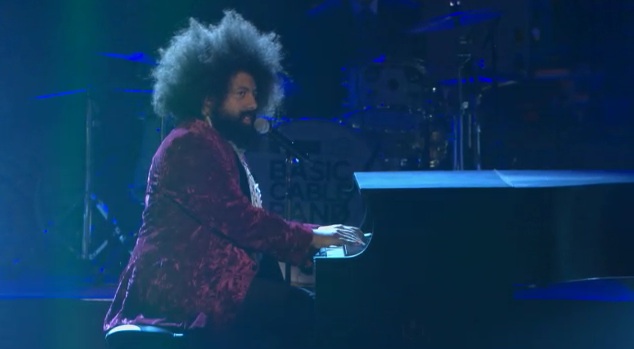 Reggie Watts welcomes Conan back to NYC with “The Boys are Back in Town”