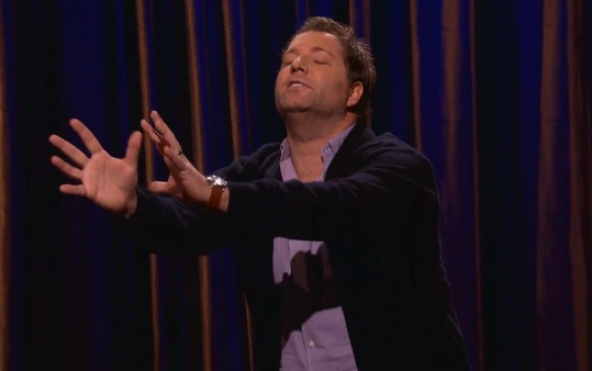 On Conan, Jay Larson tries to help a blind man