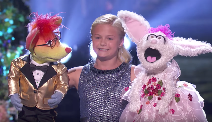 Darci Lynne performs a duet on the finals of America’s Got Talent 2017